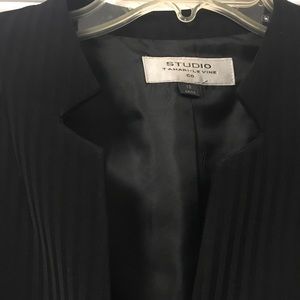 Black pinstriped power suit